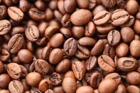 Coffee texture roasted beans from above soft light close upの写真素材