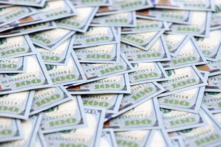 United States Dollar currency money bills. USD currency banknotes in stack with different...