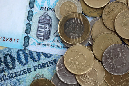 Big amount of Hungarian Forint currency money bills and coins. HUF currency banknotes and coins close upの写真素材