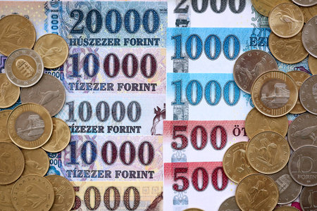 Pile of Hungarian Forint currency money bills and coins. HUF currency banknotes and coins close upの写真素材