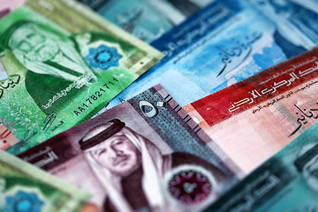 Jordanian Dinar currency money bills. JOD currency banknotes in big amount with different denomination close upの写真素材