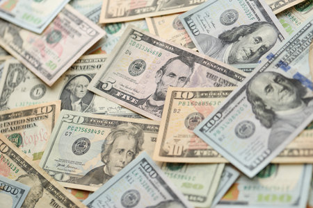 Stack of dollar bills. Hundred, fifty, twenty, ten, five dollars banknote close up viewの写真素材