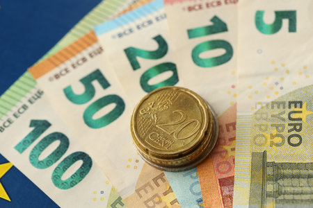 European union money currency Euro different paper notes and coins on flag close upの写真素材