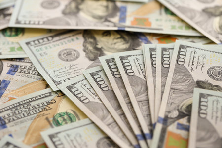Background with money American hundred dollar bills. 100 dollar bills background close up
