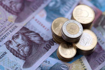 Large amount of Hungarian Forint currency money bills and coins. HUF currency banknotes and coins close upの写真素材