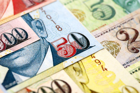Singapore Dollar currency money bills. SGD currency banknotes in pile with different denomination close upの写真素材