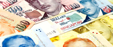 Singapore Dollar currency money bills. SGD currency banknotes in big amount with different denomination close upの写真素材