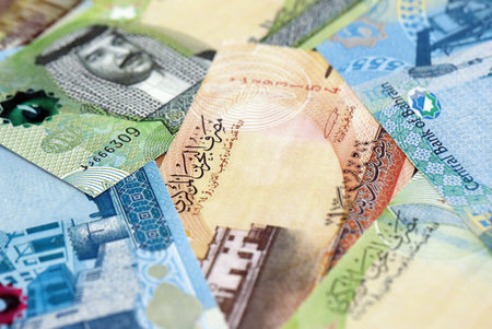 Bahraini dinar currency money bills. The current banknotes lies on table in big amount close up
