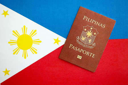 Philippines passport on flag close up. The concept of citizenshipの写真素材