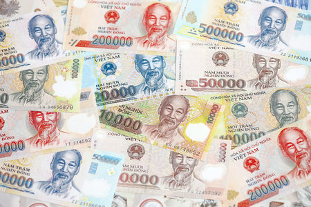 Vietnamese dong currency money bills. The current banknotes lies on table in big amount close upの写真素材