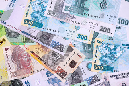 Congolese franc money bills in big amount on table close up. Rich life concept in Democratic Republic of Congo. Business and economyの写真素材