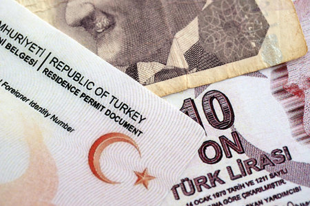 Turkey residence permit card document and turkish liras money bills banknotes. Permanent resident card in Turkiyeの写真素材
