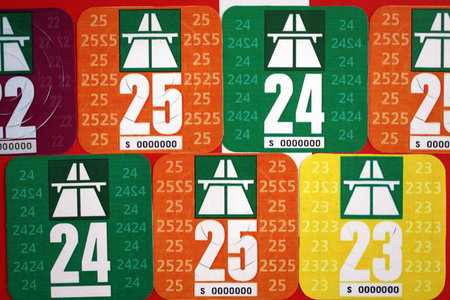 Switzerland vignette stickers for different years close up. Driving permit and registration concept