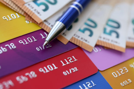 Credit cards and pen with euro currency money bills banknotes. Business, financial operations and accounting in European Unionの写真素材