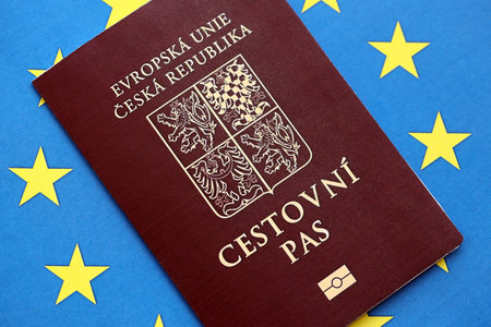 Czech biometrical passport on European Union flag background. Concept of citizenship of Czech Republicの写真素材