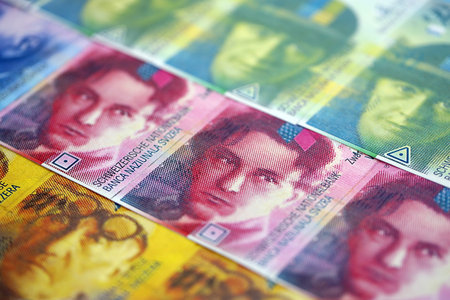 Swiss franc banknotes. The current francs money bills lies on table in big amount close up. The concept of business and investment in Switzerlandの写真素材