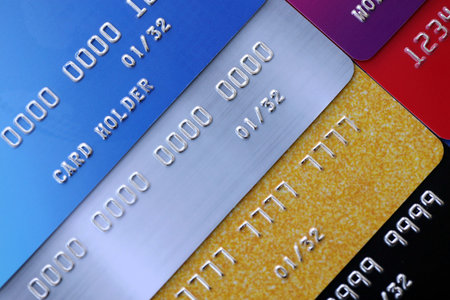 Many credit or debit cards with fictional specimen numbers. Big amount of banking plastic cards of...