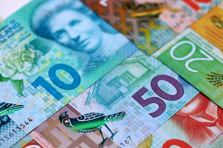 New Zealand dollar money bills in big amount on table close up. Rich life concept in New Zealand. Business and economyの写真素材