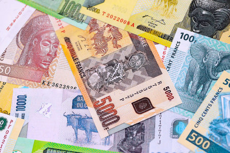 Congolese franc money bills in big amount on table close up. Rich life concept in Democratic Republic of Congo. Business and economyの写真素材