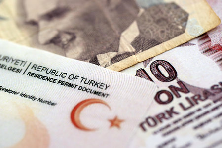 Turkey residence permit card document and turkish liras money bills banknotes. Permanent resident card in Turkiyeの写真素材