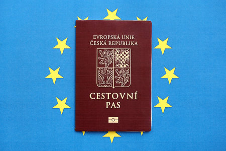 Czech biometrical passport on European Union flag background. Concept of citizenship of Czech Republicの写真素材