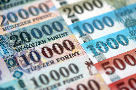 Hungarian Forints currency money bills in big amount. Stack of HUF currency banknotes with different...