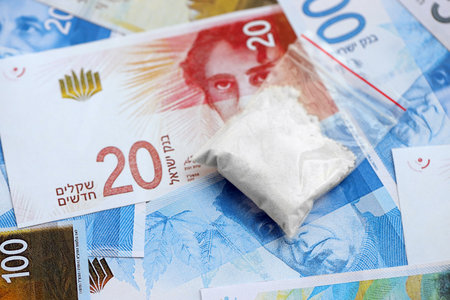 Israel New Shekels banknotes. The current Israel money bills lies on table in big amount.の写真素材