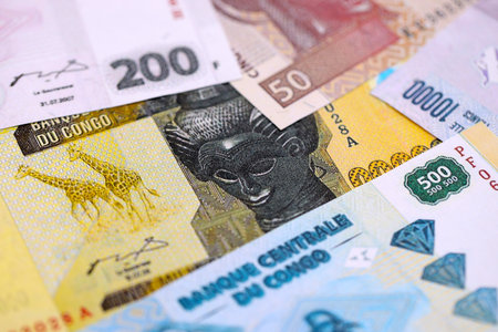 Congolese franc money bills in big amount on table close up. Rich life concept in Democratic Republic of Congo. Business and economyの写真素材