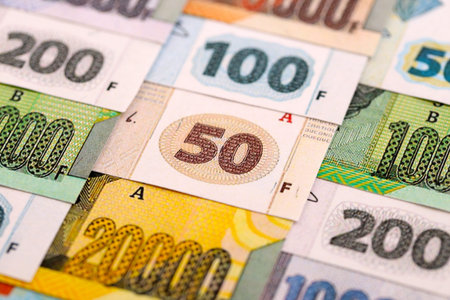 Congolese franc money bills in big amount on table close up. Rich life concept in Democratic...