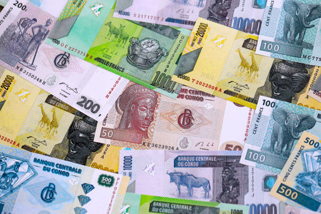 Congolese franc money bills in big amount on table close up. Rich life concept in Democratic Republic of Congo. Business and economyの写真素材