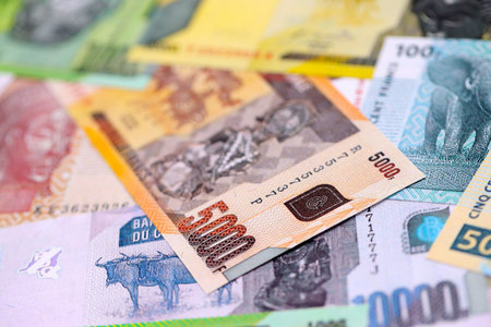 Congolese franc money bills in big amount on table close up. Rich life concept in Democratic Republic of Congo. Business and economyの写真素材