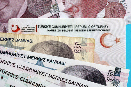 Turkey residence permit card document and turkish liras money bills banknotes. Permanent resident...