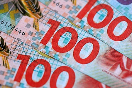 New Zealand dollar money bills in big amount on table close up. Rich life concept in New Zealand. Business and economyの写真素材