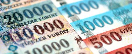 Hungarian Forints currency money bills in big amount. Many HUF currency banknotes with different denomination close upの写真素材