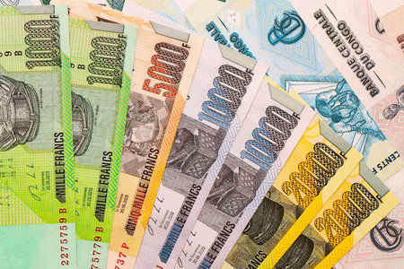 Congolese franc money bills in big amount on table close up. Rich life concept in Democratic Republic of Congo. Business and economyの写真素材