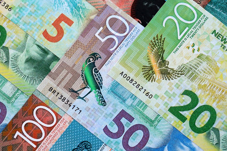 New Zealand dollar money bills in big amount on table close up. Rich life concept in New Zealand. Business and economyの写真素材