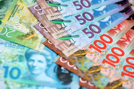 New Zealand dollar money bills in big amount on table close up. Rich life concept in New Zealand. Business and economyの写真素材