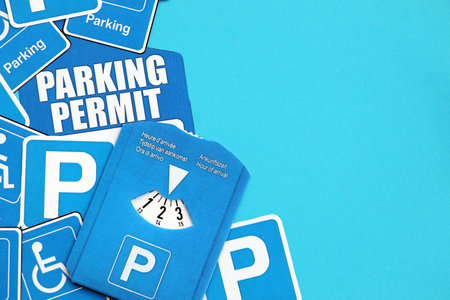 Parking permit paper notice tag and parking disc. Parking permit for people with disabilities conceptの写真素材