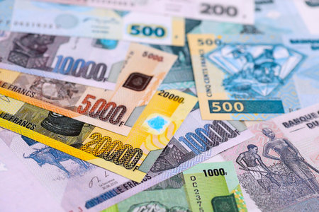 Congolese franc money bills in big amount on table close up. Rich life concept in Democratic Republic of Congo. Business and economyの写真素材