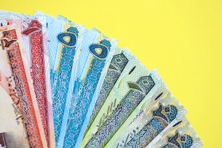 Bahraini dinar money bills in big amount on yellow close up. Finance and banking conceptの写真素材