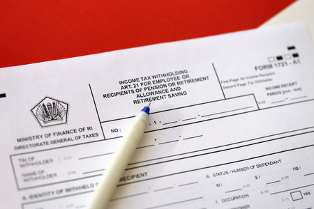 KYIV, UKRAINE - JANUARY 27, 2024 Indonesian tax form 1721 a1 Income Tax withholding art 21 for employee or recipients of pension or retirement allowance and retirement savingsのeditorial素材