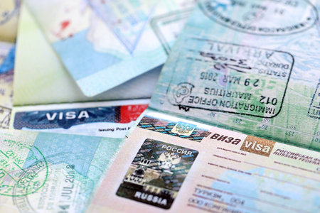 Fragment of Russian Federation visa in passport page close up. Concept of travel and tourism worldwideの写真素材