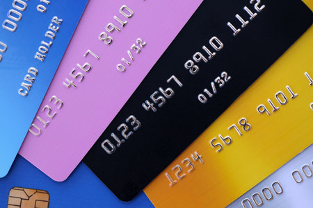 Many credit or debit cards with fictional specimen numbers. Big amount of banking plastic cards of...