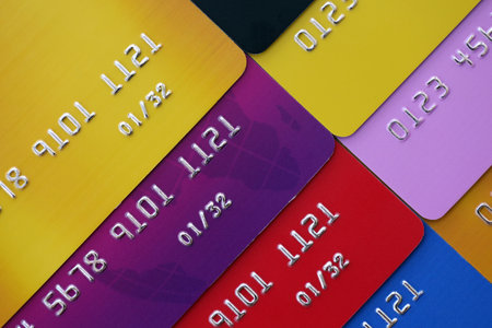 Many credit or debit cards with fictional specimen numbers. Big amount of banking plastic cards of various colors. Financial concept of business and e-commerceの写真素材
