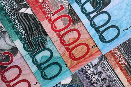 Dominican Republic Pesos currency money bills. DOP currency banknotes in bunch with different denomination close upの写真素材