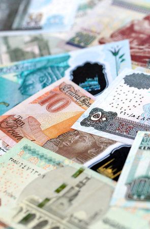 Egyptian pound currency money bills. The current banknotes lies on table in big amount close up
