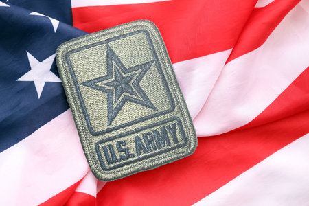 KYIV, UKRAINE - OCTOBER 7, 2025 United States Army patch on United States flag close up