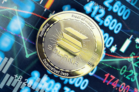 KYIV, UKRAINE - OCTOBER 9, 2025 Solana cryptocurrency coin sticker on chart values banner. Concept of modern crypto moneyのeditorial素材