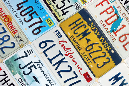 KYIV, UKRAINE - OCTOBER 18, 2025 Many US license plates of different states registration. Big amount of United States number platesのeditorial素材