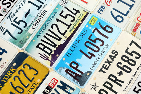 KYIV, UKRAINE - OCTOBER 18, 2025 Many US license plates of different states registration. Big amount of United States number platesのeditorial素材